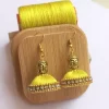 Handmade silk thread buddha earrings 1